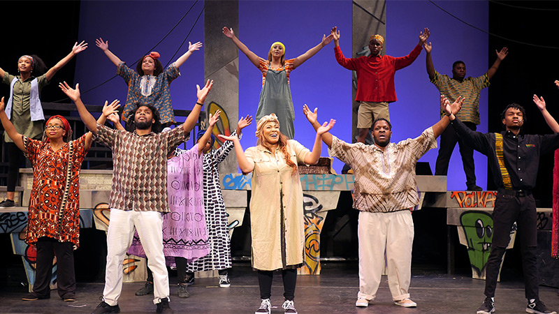 Photo of actors on stage in Black Nativity